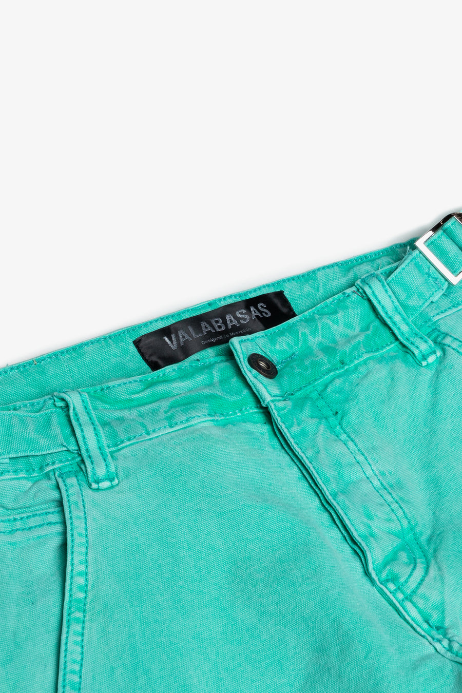 “REVIVAL" LT. GREEN WASH STACKED FLARE JEAN