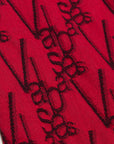 "V-SCRAWL" BLACK RED STACKED FLARE JEAN