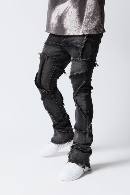 "PATCHWORK" FADED BLACK STACKED FLARE JEAN