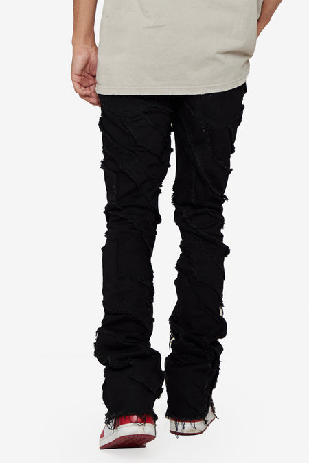 “SABER” BLACK WAXED STACKED FLARE JEAN