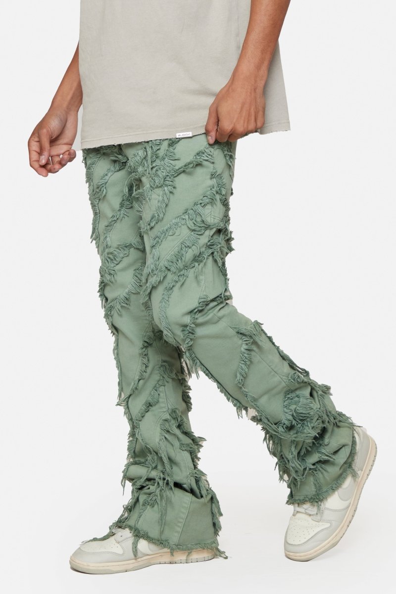 "GRIT” LIGHT EMERALD STACKED FLARE JEAN