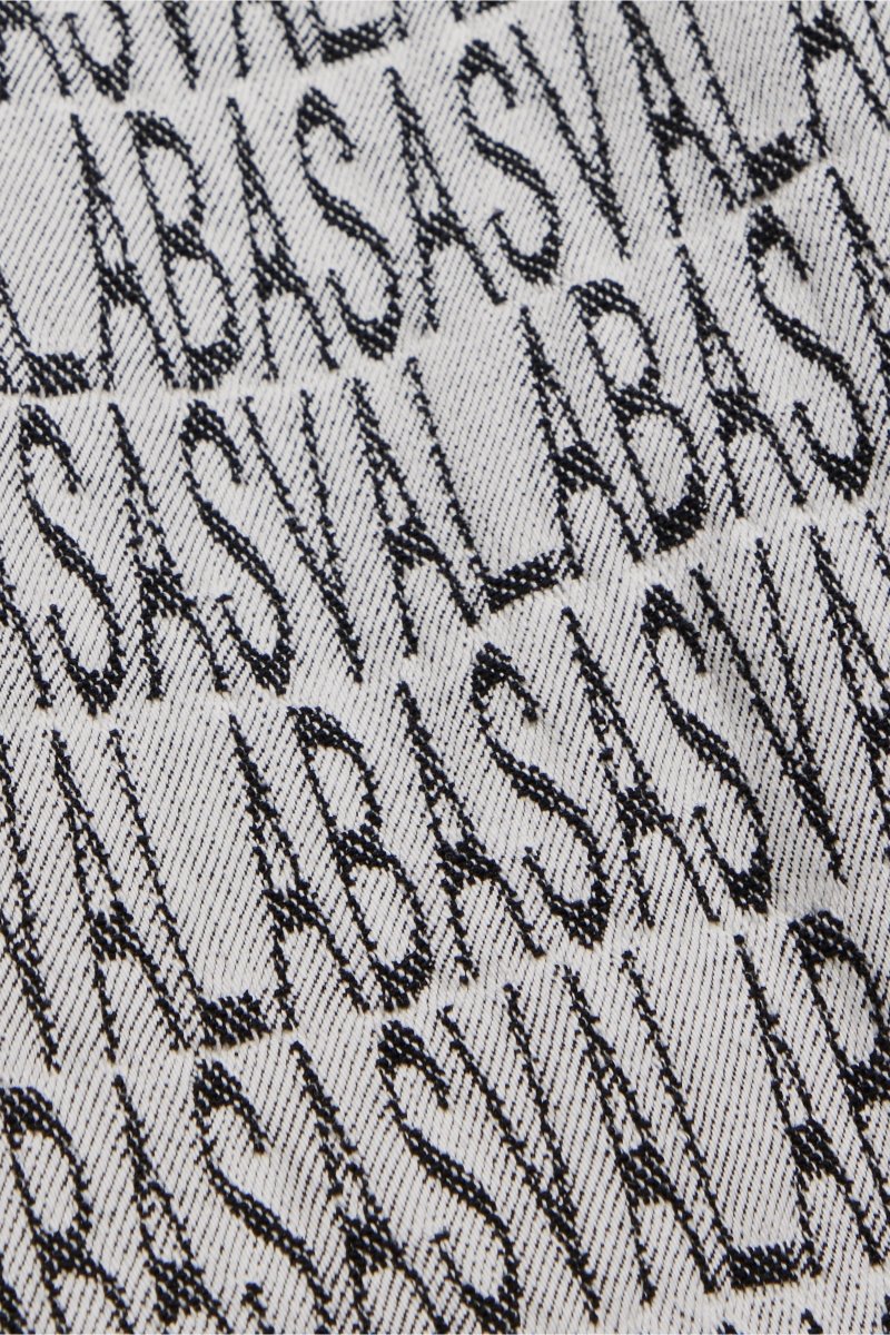 "IMPRINT” STACKED FLARE JEAN BLACK WHITE - Valabasas