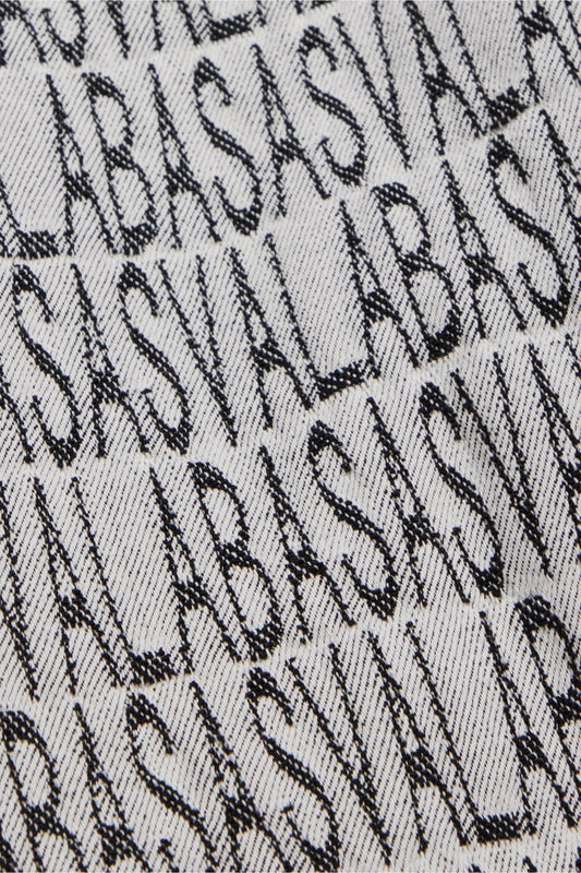 "IMPRINT” STACKED FLARE JEAN BLACK WHITE - Valabasas