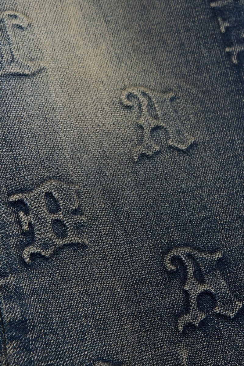 "KAID" DIRTY WASH STACKED FLARE JEAN