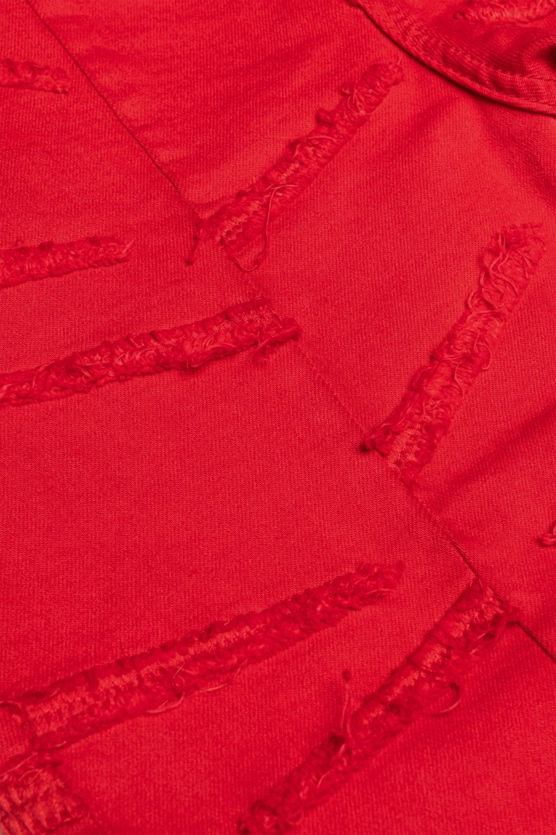 “SABER” STACKED FLARE JEAN RED WASHED - Valabasas