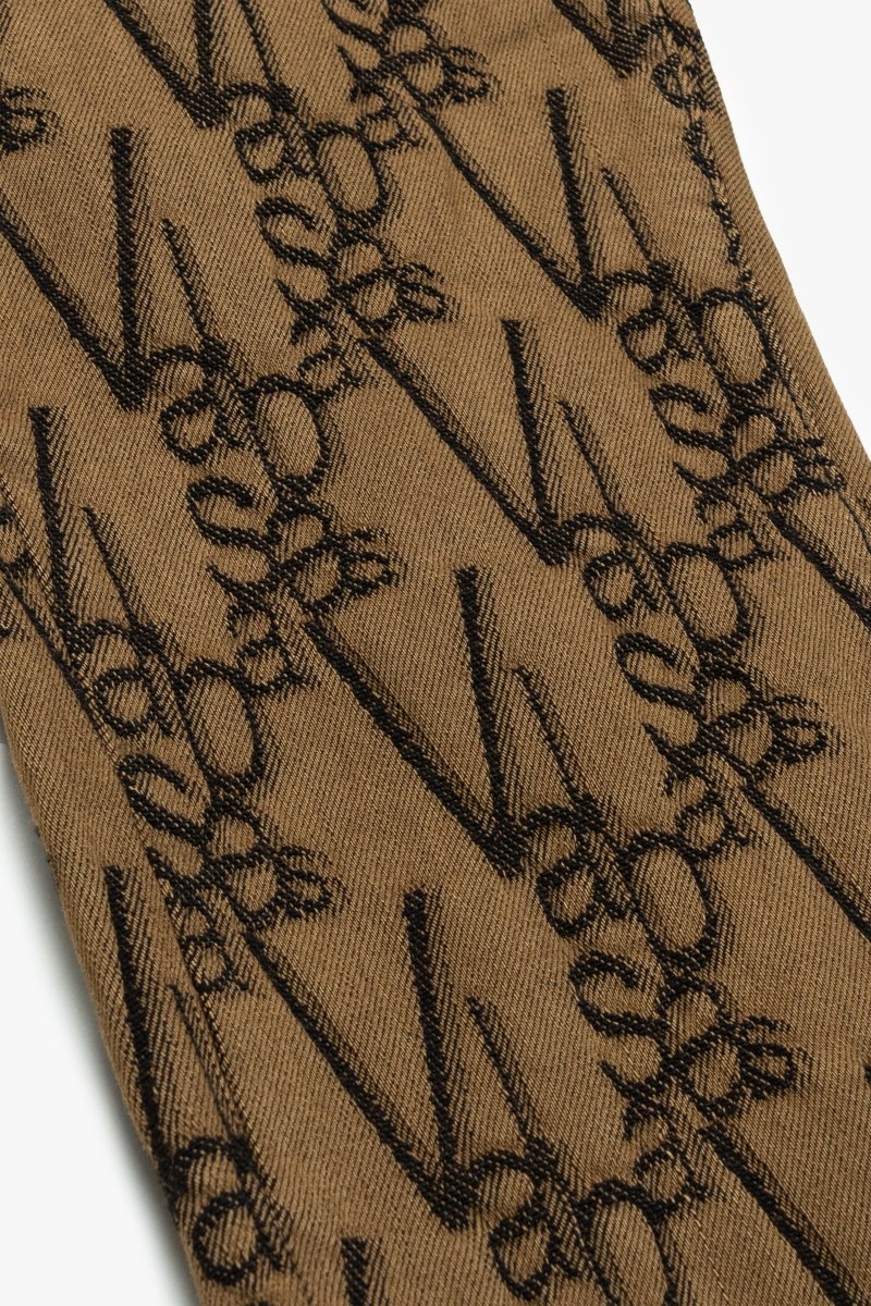 "V - SCRAWL" STACKED FLARE JEAN BLACK BROWN - Valabasas