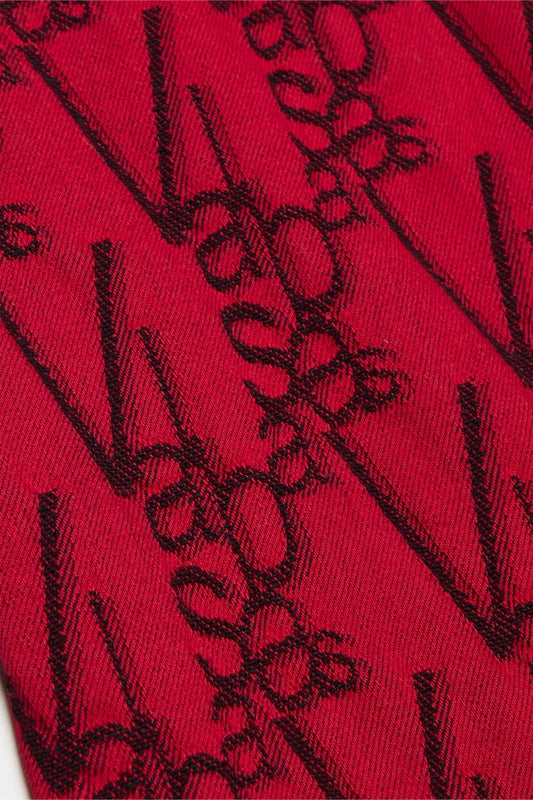 "V - SCRAWL" STACKED FLARE JEAN BLACK RED - Valabasas