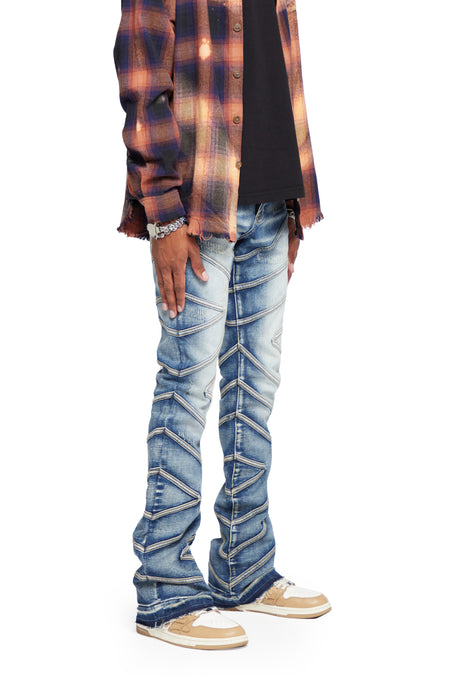 “CASSIUS” LIGHT WASH STACKED FLARE JEAN